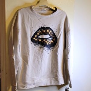 LV biting lip soft sweatshirt.  Size small.